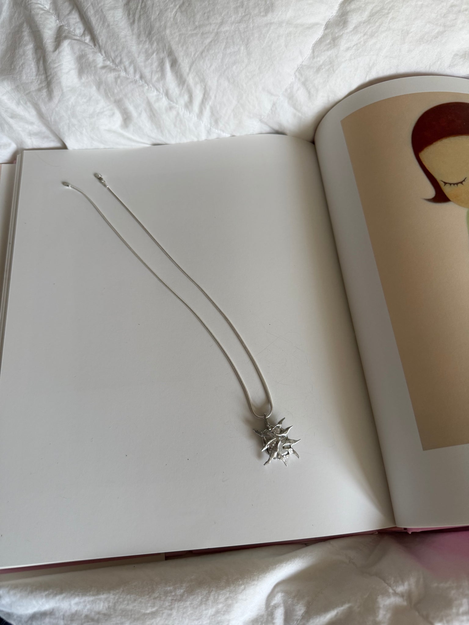 „ori“ pierced charm- Monoklin